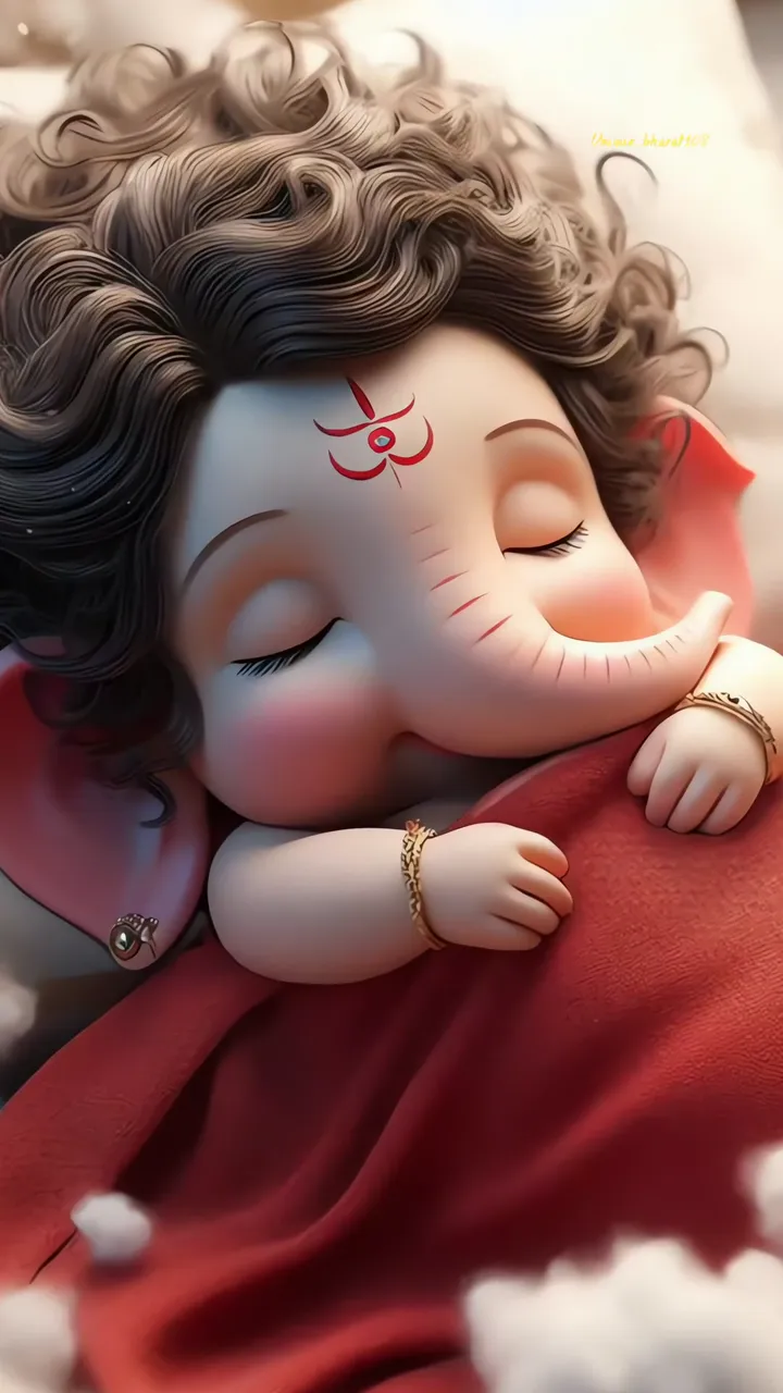 Cute Sleeping Ganesha With Red Cloth And Gold Bracelets