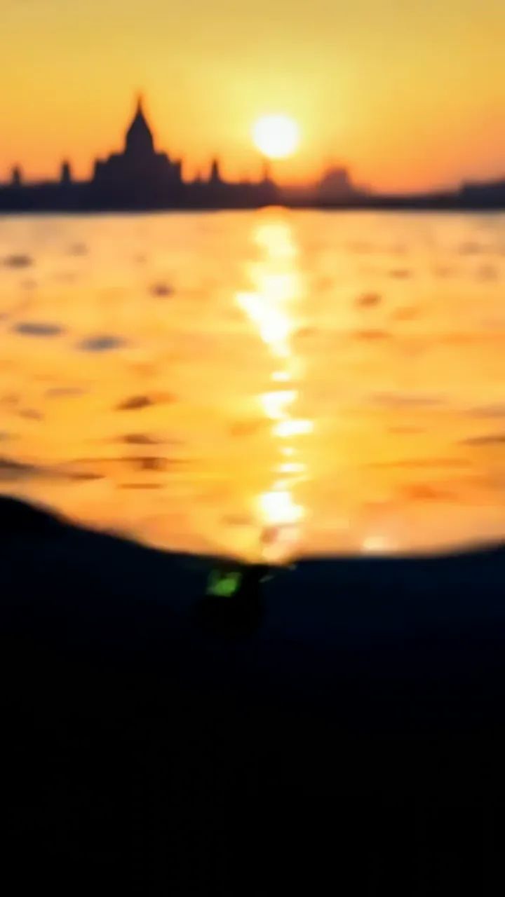 Sunset Over Ancient Temple Reflection On Water