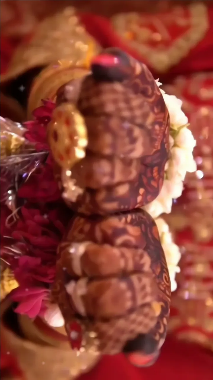 Bridal Hand With Intricate Mehndi Design At Wedding