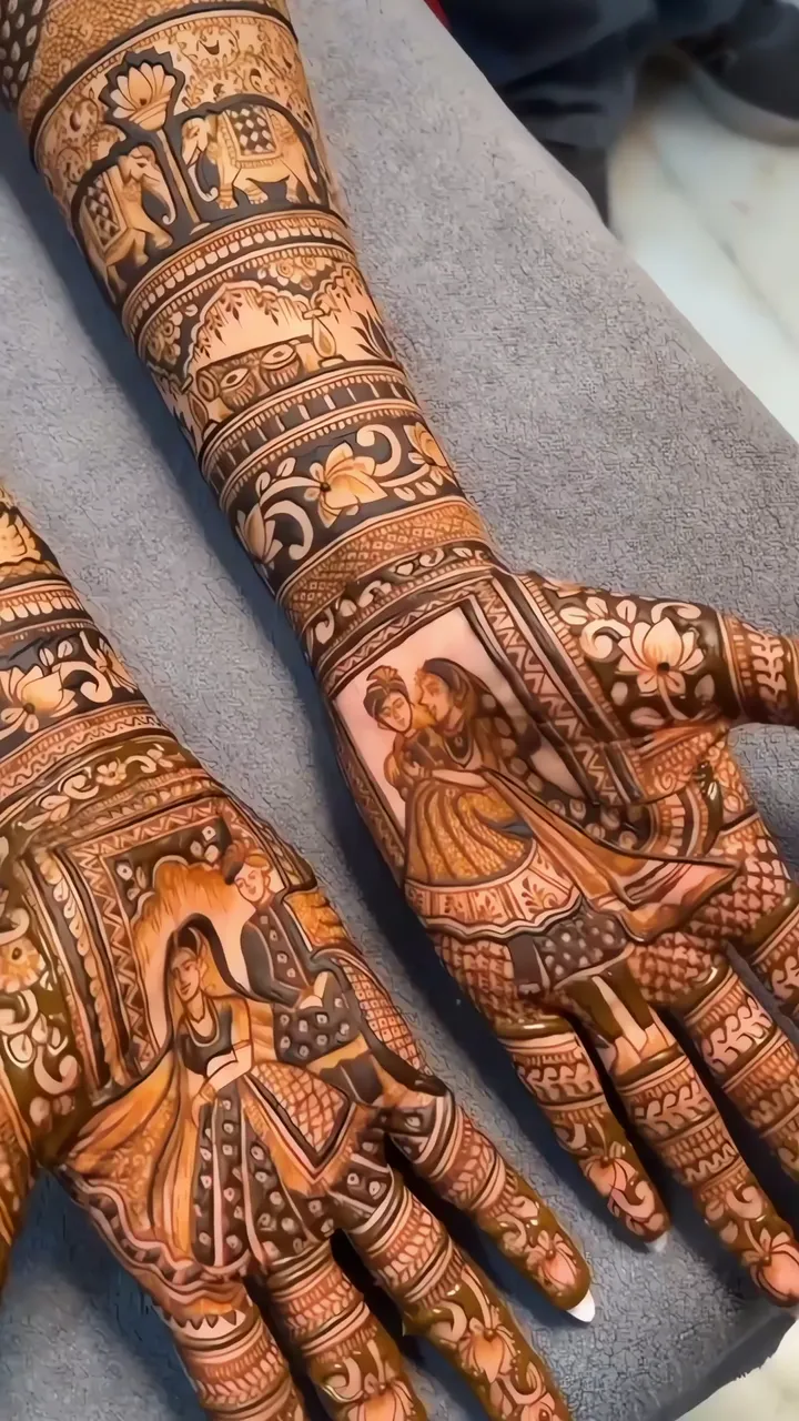 Intricate Bridal Mehndi Design With Elephant And Couple Scene