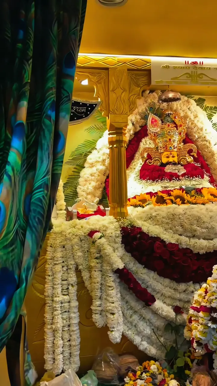 Krishna Devotional Temple Scene With Floral Decor And Golden Altar