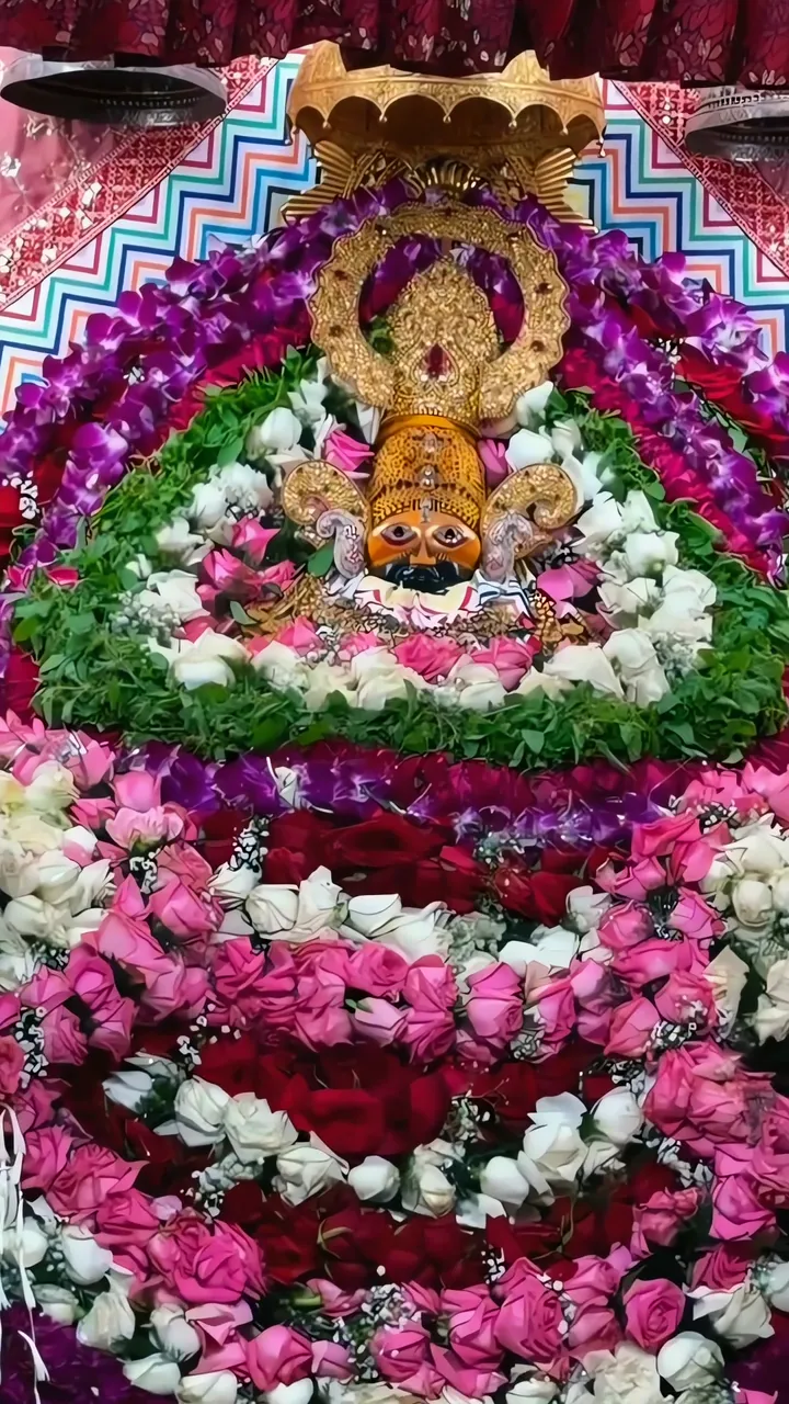 Krishna Idol Adorned With Purple And Pink Roses At Khatushyam Temple