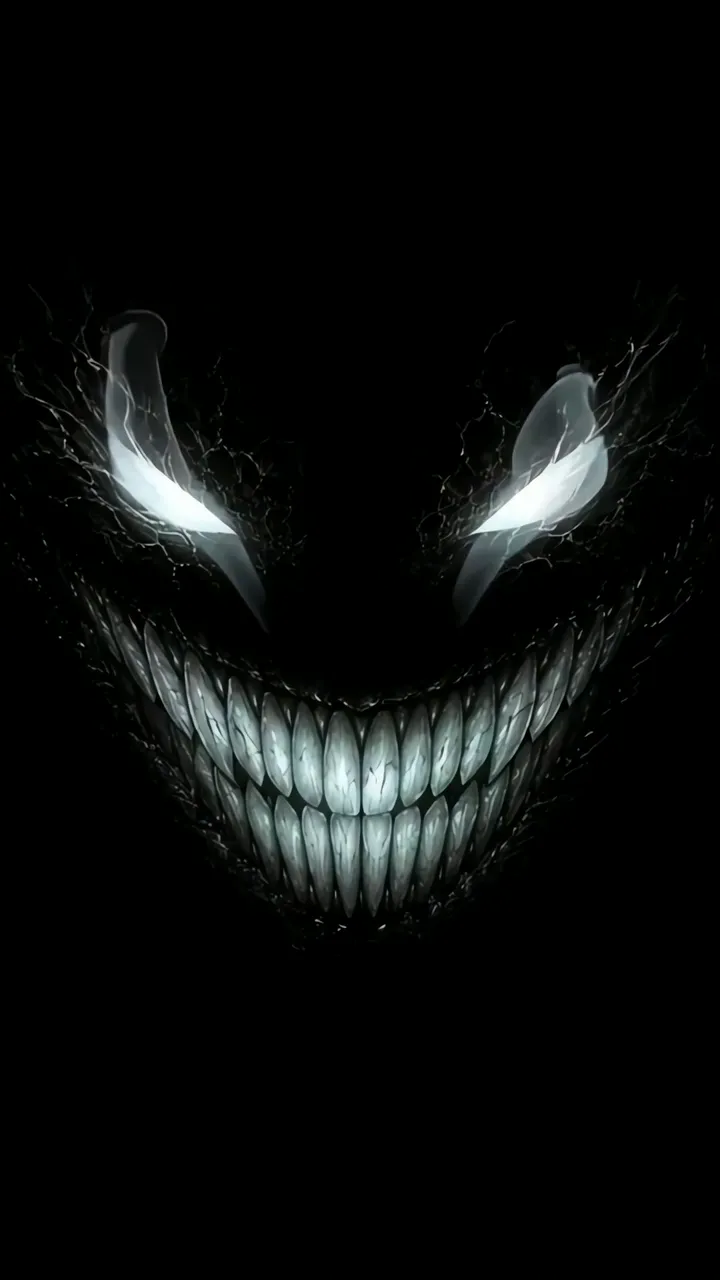 Smiling Phantom With Glowing Eyes And Sharp Teeth