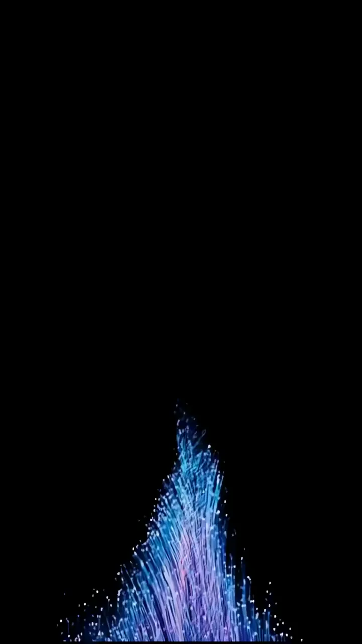 Blue Fiber Optic Fountain Rising Against Black Background