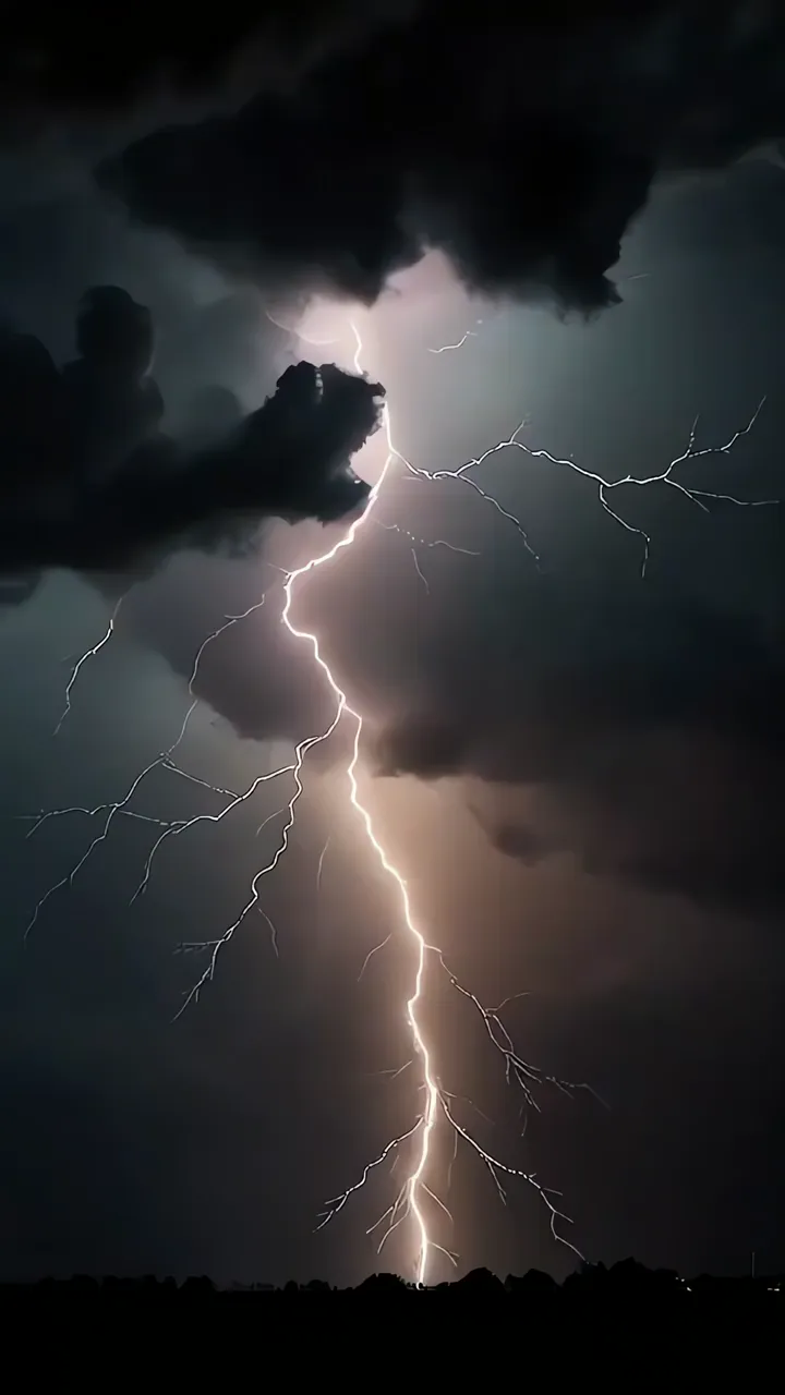 Powerful Lightning Strike Through Dark Storm Clouds