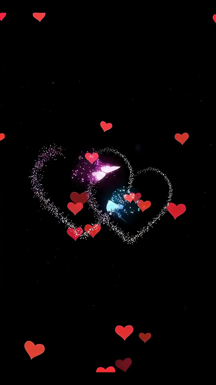 Two Hearts With Sparkling Love Animation On Black Background