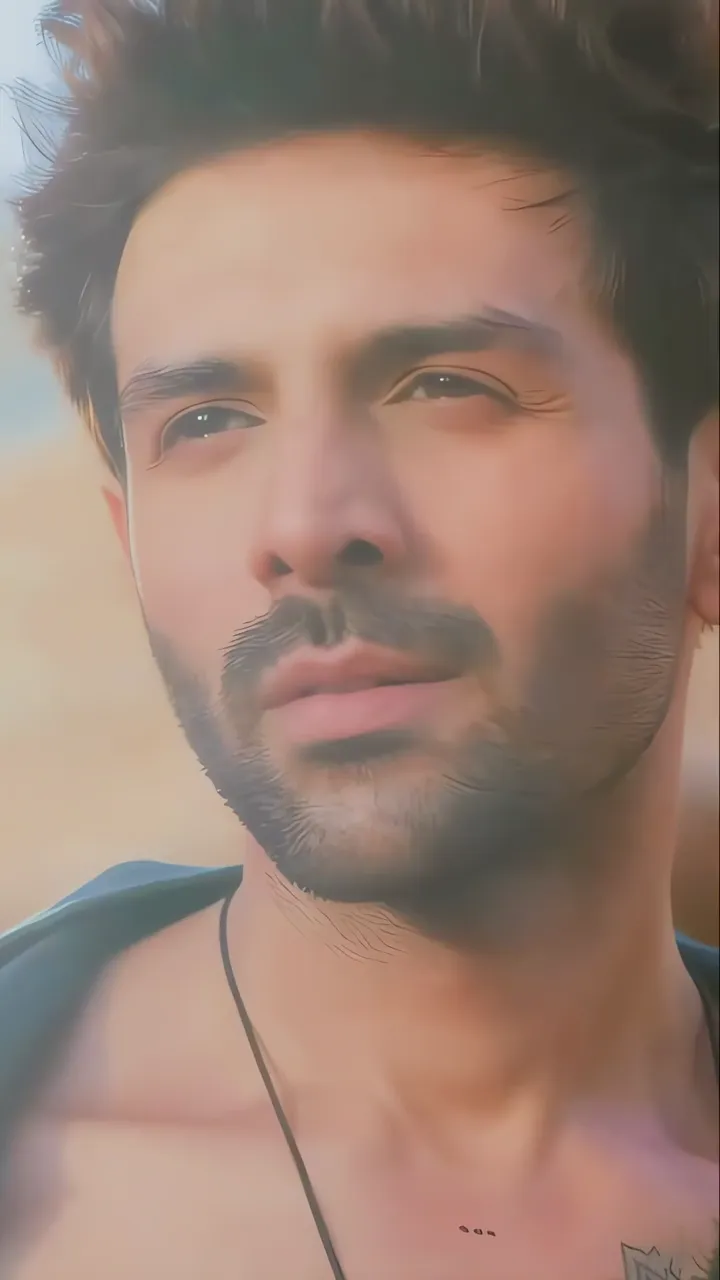 Handsome Indian Actor With Tattoo And Sunlit Hair