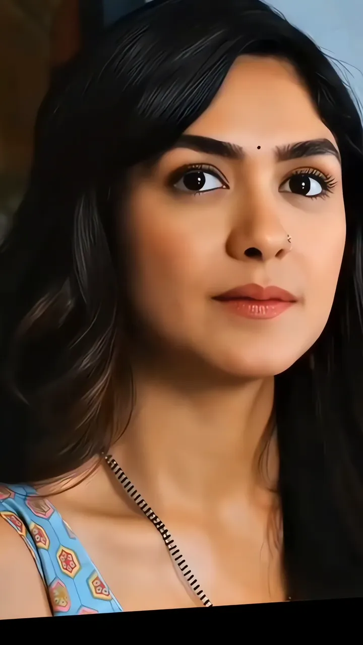 Beautiful Indian Girl With Black Hair And Blue Top