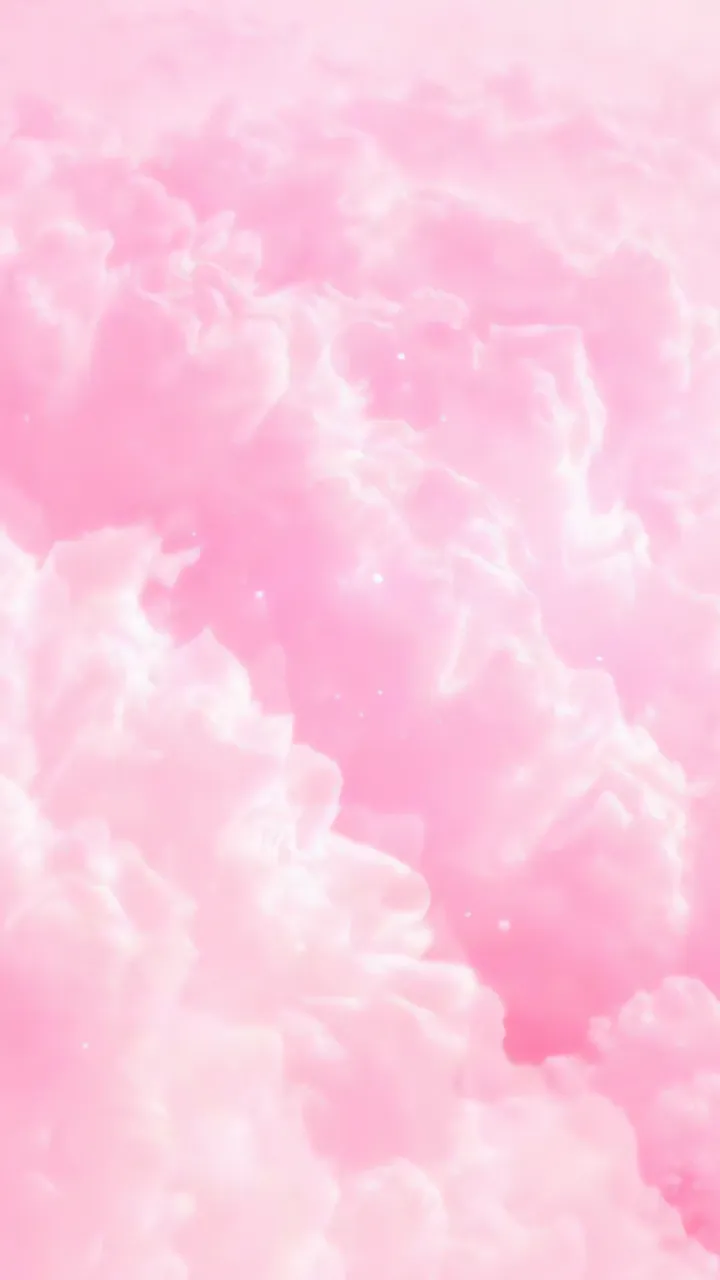 Soft Pink Clouds With Gentle Glow And Floating Sparkles