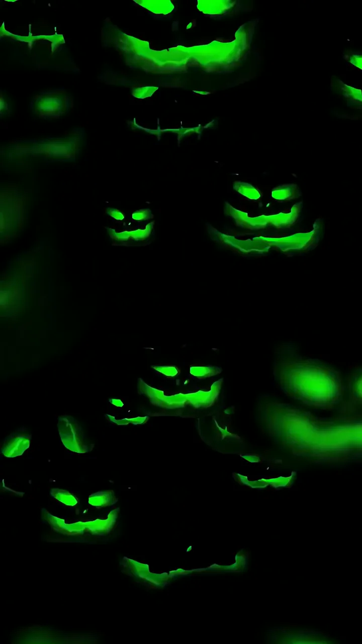 Spooky Green Glowing Jack-o'-Lantern Halloween Background