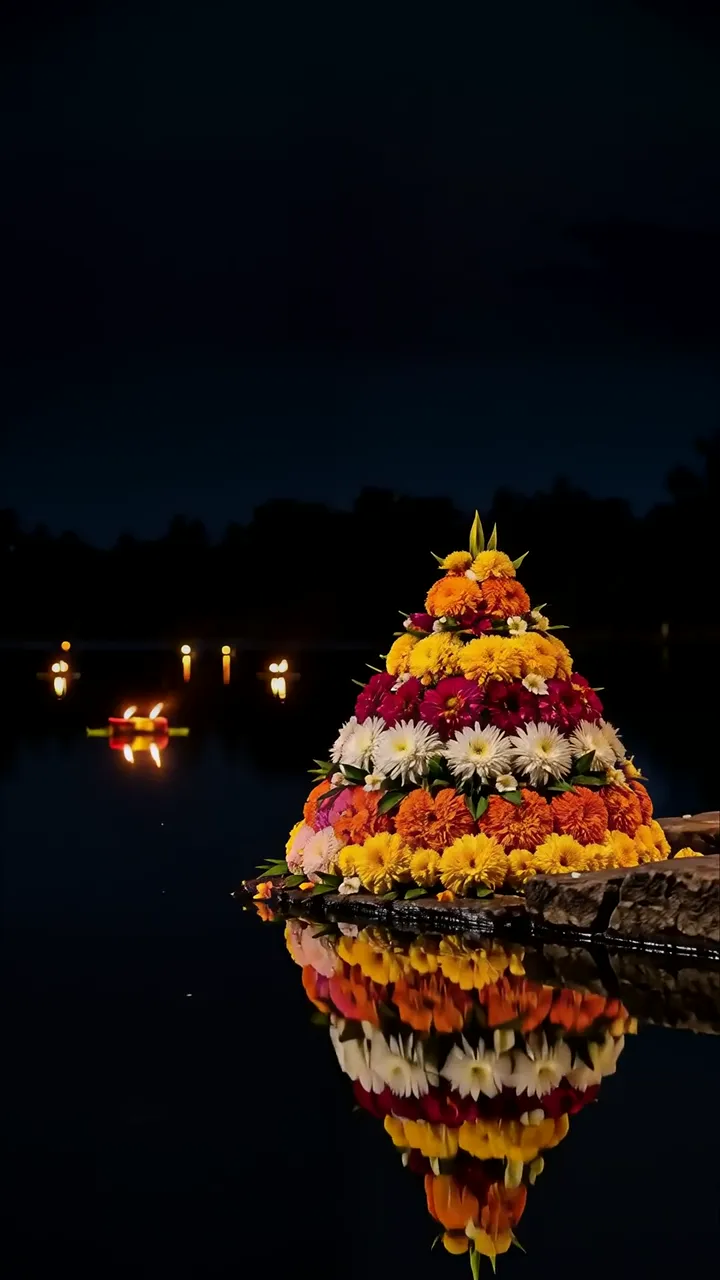 Colorful Flower Pyramid Reflection On Lake During Diwali Night